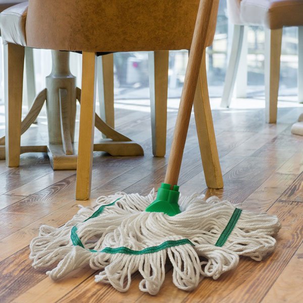 Green Trinity Hygiene mop in use
